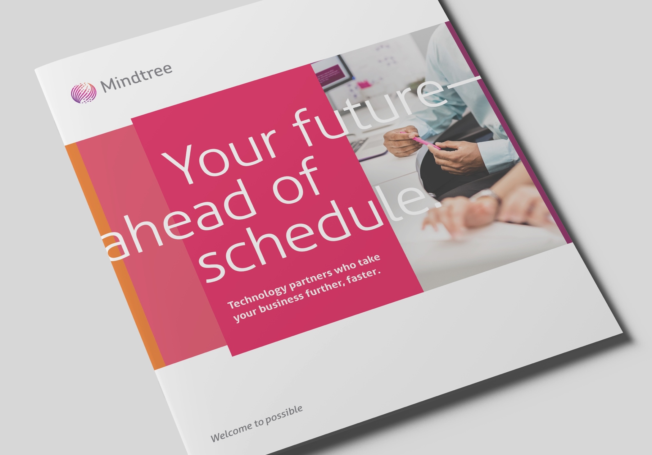 Close-up of Mindtree’s company brochure resting on a table.