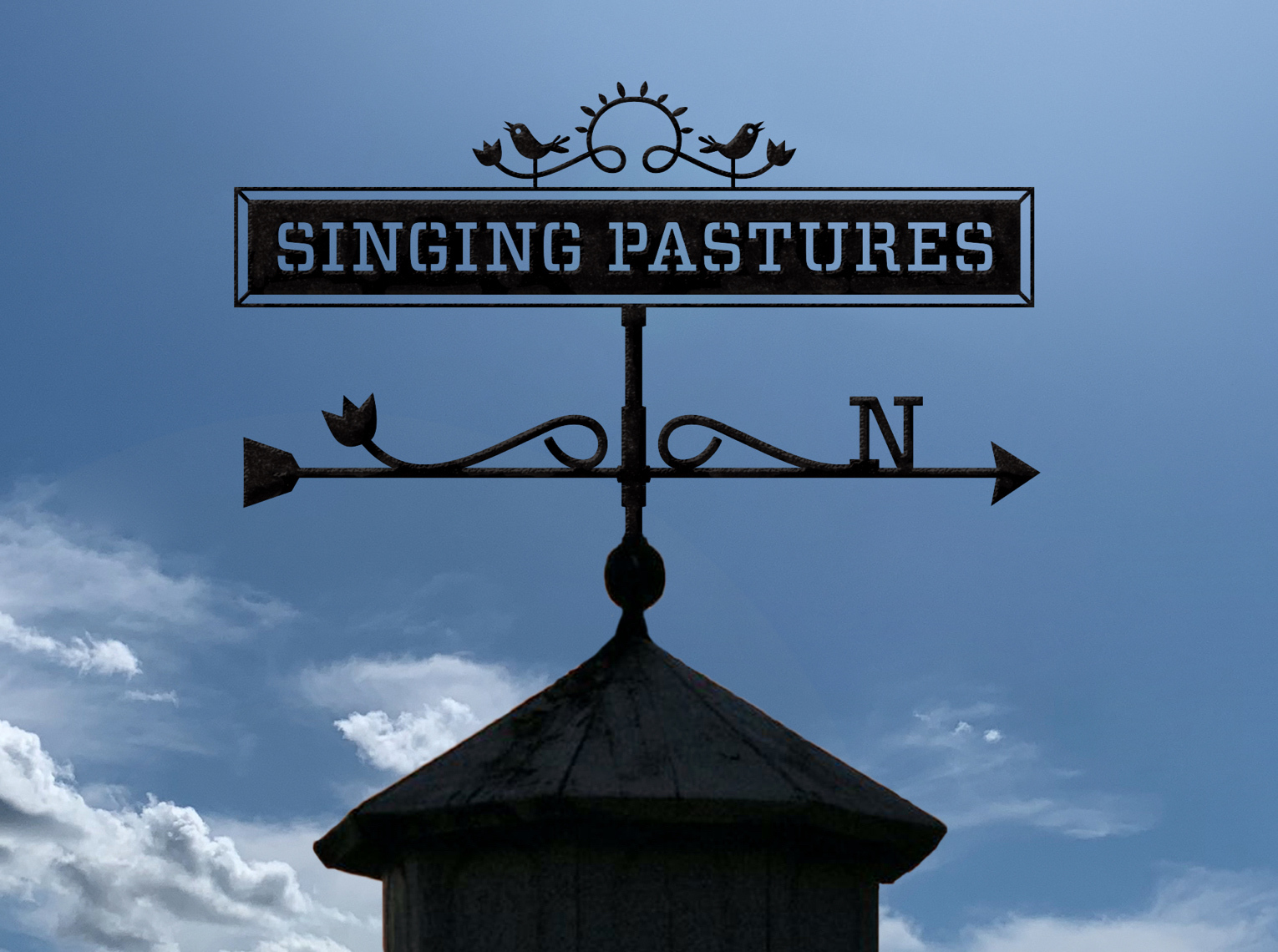 Close up the the Singing Pastures' logotype on a weathervane atop a barn.