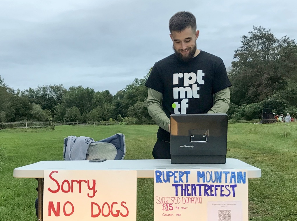 Photos showing volunteers wearing Rupert Mountain Theatrefest T-shirts before the production