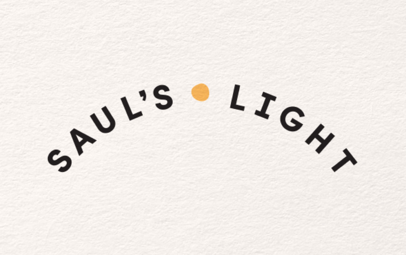 The Saul's Light logo: arced lettering with a yellow, sun-like dot centered between the words.