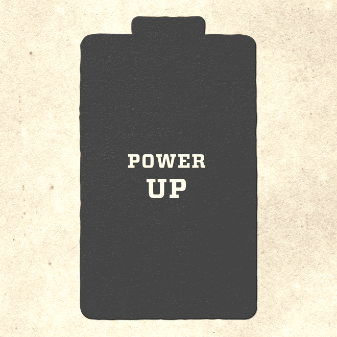 The shape of a battery with the words "Power up" superimposed. Indivdual snack packages stack up as if to charge the battery