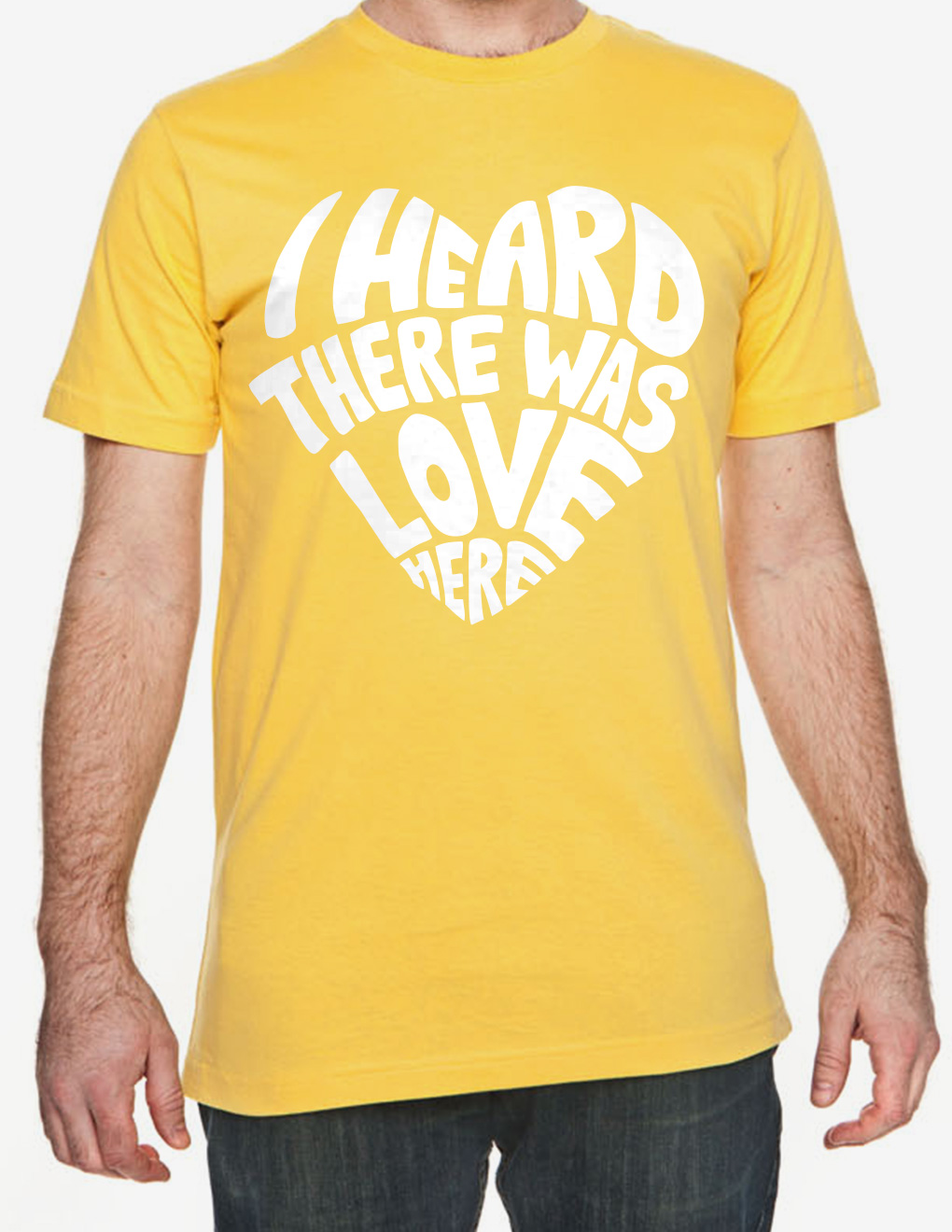 An Orphans Rising branded T shirt with a text design in the shape of a heart that says, I heard there was love here.