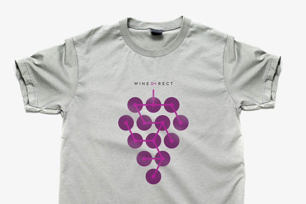 Wine Direct tee shirt illustrated with a bunch of grapes connected by dots and lines that represent e-commerce.