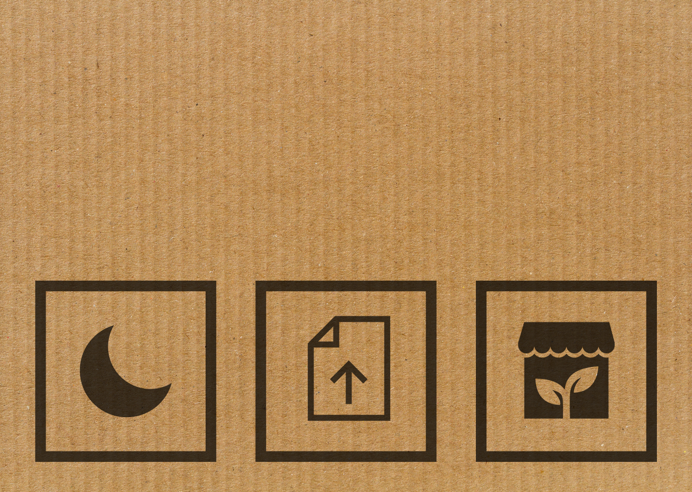 Cardboard background with symbols for dark mode, uploading paper document digitally, and eco-friendly businesses.