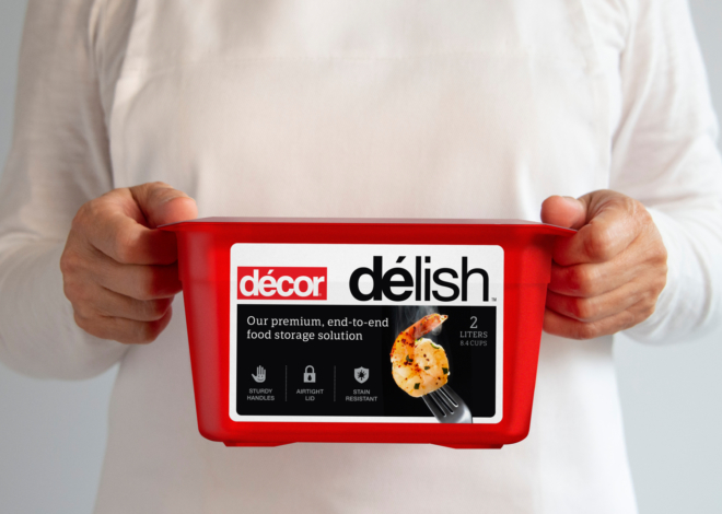 Decor "Delish" microwave container held by two hands waist high. 