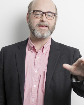 Headshot of Jay Sherman-Godfrey